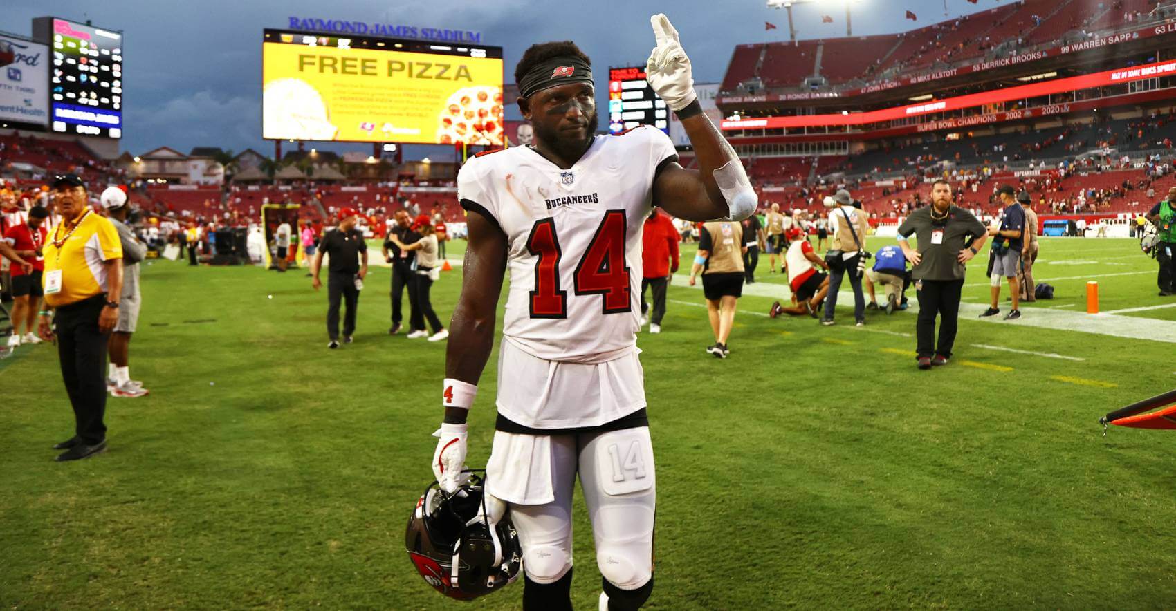Tampa Bay Buccaneers wide receiver Chris Godwin (14) greets the fans after they beat the Washington Commanders at Raymond James Stadium.