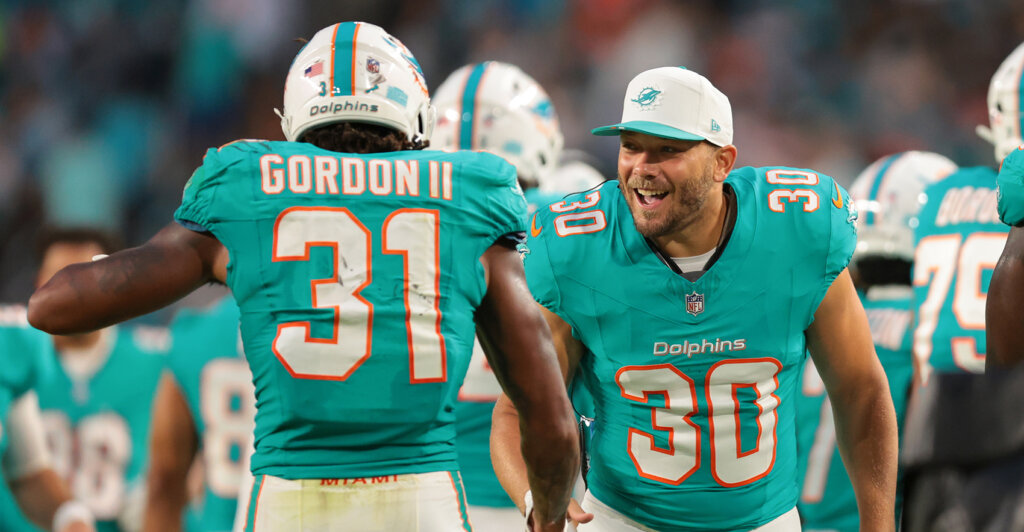 Aug 23, 2025; Miami Gardens, Florida, USA; Miami Dolphins fullback Alec Ingold (30) celebrates with running back Ollie Gordon II (31) against the Jacksonville Jaguars during the second quarter at Hard Rock Stadium. Mandatory Credit: Sam Navarro-Imagn Images