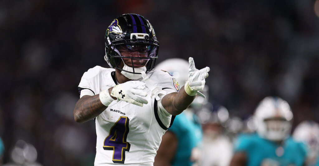 Oct 30, 2025; Miami Gardens, Florida, USA; Baltimore Ravens wide receiver Zay Flowers (4) reacts after a runs for a gain during the third quarter against the Miami Dolphins at Hard Rock Stadium. Mandatory Credit: Nathan Ray Seebeck-Imagn Images