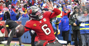 Nov 16, 2025; Orchard Park, New York, USA; Tampa Bay Buccaneers quarterback Baker Mayfield (6) celebrates his touchdown against the Buffalo Bills during the second quarter of the game at Highmark Stadium. Mandatory Credit: Mark Konezny-Imagn Images