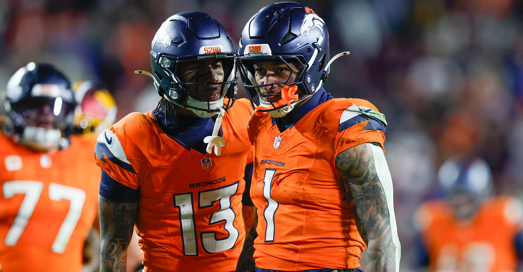 Nov 30, 2025; Landover, Maryland, USA; Denver Broncos tight end Evan Engram (1) celebrates after a play against the Washington Commanders with wide receiver Pat Bryant (13) in overtime of the game at Northwest Stadium. Mandatory Credit: Peter Casey-Imagn Images
