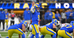 Jan 4, 2026; Inglewood, California, USA; Los Angeles Rams quarterback Matthew Stafford (9) yells at the line of scrimmage against the Arizona Cardinals during the first half at SoFi Stadium. Mandatory Credit: Jayne Kamin-Oncea-Imagn Images