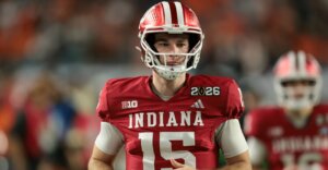 Indiana Hoosiers quarterback Fernando Mendoza (15) looks on during warmups prior to the College Football Playoff National Championship game against the Miami Hurricanes at Hard Rock Stadium.