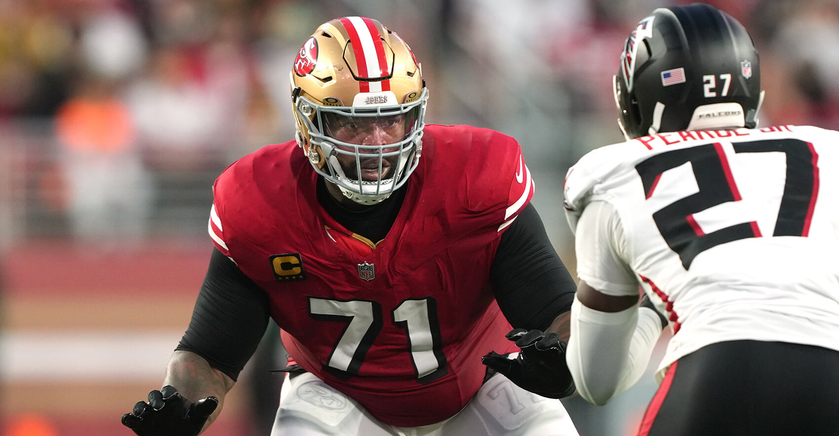 Oct 19, 2025; Santa Clara, California, USA; San Francisco 49ers offensive tackle Trent Williams (71) blocks against Atlanta Falcons defensive end James Pearce Jr. (27) during the second quarter at Levi's Stadium. Mandatory Credit: Darren Yamashita-Imagn Images
