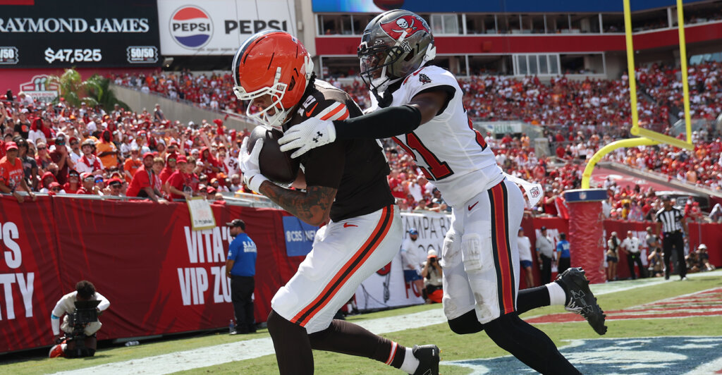 Sep 20, 2026; Tampa, Florida, USA; Tampa Bay Buccaneers cornerback Benjamin Morrison (21) defends against Cleveland Browns wide receiver Denzel Boston (12) during the second half at Raymond James Stadium. Mandatory Credit: Kim Klement Neitzel-Imagn Images