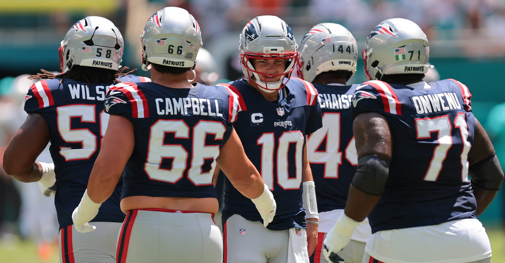 Sep 14, 2025; Miami Gardens, Florida, USA; New England Patriots quarterback Drake Maye (10) shake hands with New England Patriots offensive tackle Will Campbell (66) before the game against the Miami Dolphins at Hard Rock Stadium. Mandatory Credit: Sam Navarro-Imagn Images
