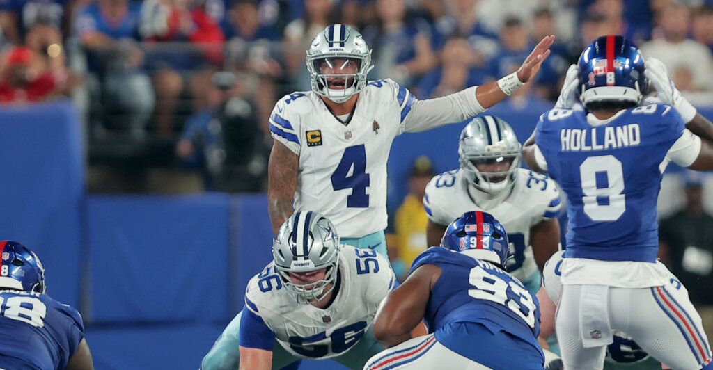 Sep 13, 2026; East Rutherford, New Jersey, USA; Dallas Cowboys quarterback Dak Prescott (4) lines up behind center Cooper Beebe (56) during the first quarter against the New York Giants at MetLife Stadium. Mandatory Credit: Brad Penner-Imagn Images