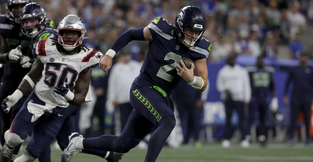 Sep 9, 2026; Seattle, Washington, USA; Seattle Seahawks quarterback Drew Lock (2) scrambles during the fourth quarter against the New England Patriots at Lumen Field. Mandatory Credit: Joe Nicholson-Imagn Images