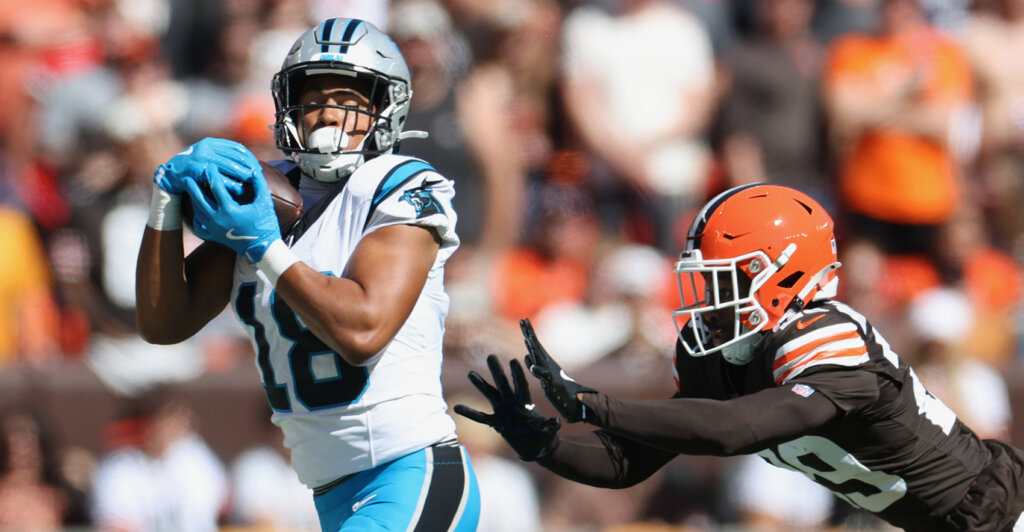 Sep 27, 2026; Cleveland, Ohio, USA; Carolina Panthers wide receiver Jalen Coker (18) makes a catch defended by Cleveland Browns cornerback Mekhi Blackmon (29) during the second quarter at Huntington Bank Field. Mandatory Credit: Scott Galvin-Imagn Images
