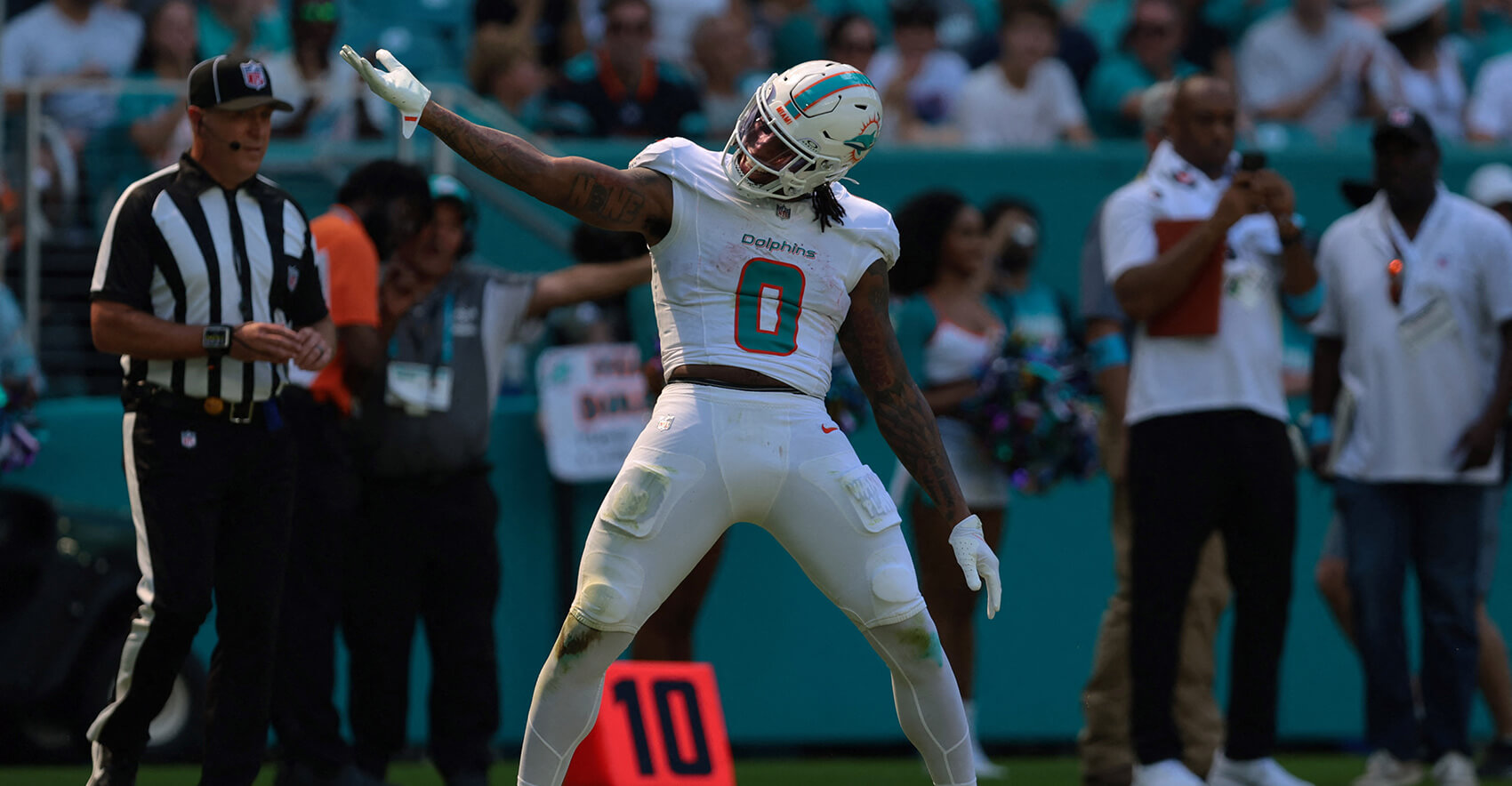 Oct 11, 2026; Miami Gardens, Florida, USA; Miami Dolphins running back Ollie Gordon II (0) celebrates after he runs with the ball against the Cincinnati Bengals during the first quarter at Hard Rock Stadium. Mandatory Credit: Sam Navarro-Imagn Images