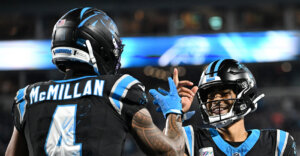 Oct 4, 2026; Charlotte, North Carolina, USA; Carolina Panthers wide receiver Tetairoa McMillan (4) celebrates with quarterback Bryce Young (9) after scoring a touchdown against the Detroit Lions during the third quarter at Bank of America Stadium. Mandatory Credit: Bob Donnan-Imagn Images