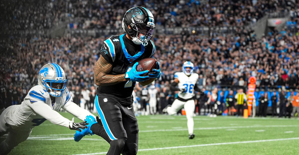 Carolina Panthers wide receiver Tetairoa McMillan makes a catch for a touchdown against Detroit Lions cornerback D.J. Reed during the first half at Bank of America Stadium in Charlotte on Sunday, Oct. 4, 2026.